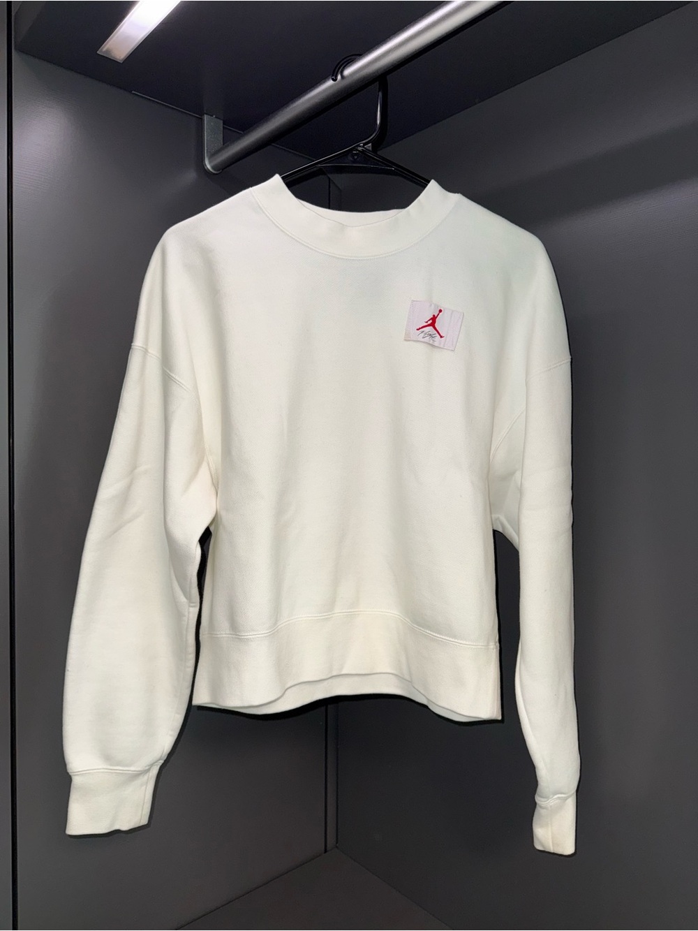 Nike White Crewneck Sweatshirt with Red Jumpman Patch
